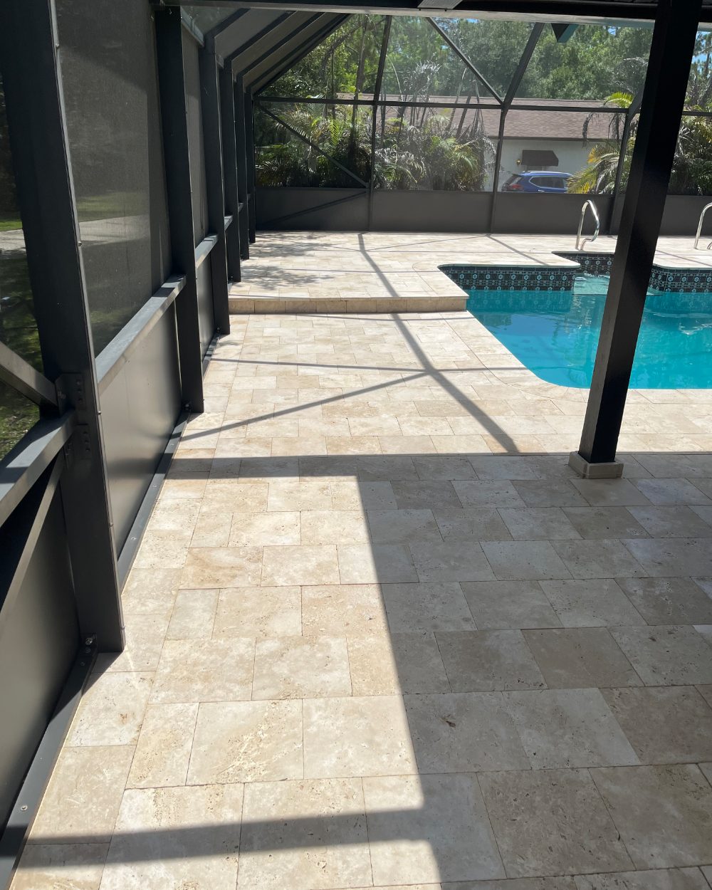 Cleaned and sealed travertine paver pool deck